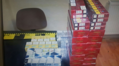 Sute de pachete cu țigări de contrabandă confiscate în piață
