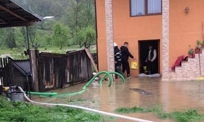 Gospodării inundate în Maramureș (GALERIE FOTO)