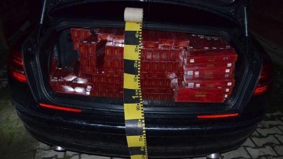 Țigări de 166.000 de lei confiscate și un Audi A8 indisponibilizat