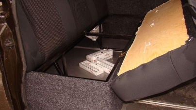 Contrabandă: Ţigări ascunse în bancheta din spate a unui microbuz (FOTO)