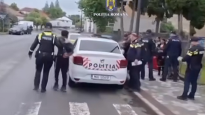 Scandalagii cercetați după ce au amenințat un polițist