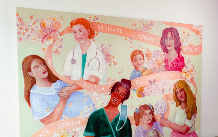 O pictură pe pânză de mari dimensiuni, semnată de Carina Gheție și Doris Coman, a fost amplasată în Secția de Maternitate a Spitalului Județean de Urgență “Dr. Constantin Opriș” Baia Mare