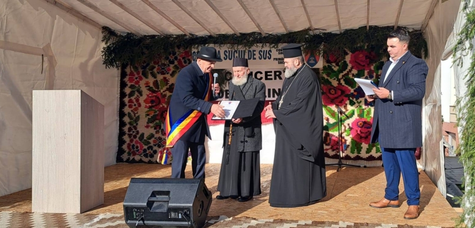 Părintele Arhimandrit Gavriil Burzo a primit Titlul de Cetățean de Onoare al comunei Suciu de Sus