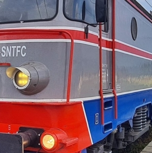 Mașină acroșată de tren la Sighet