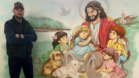 Polițist de frontieră de la SPF Sighet, artist în timpul liber: sute de picturi pentru copii